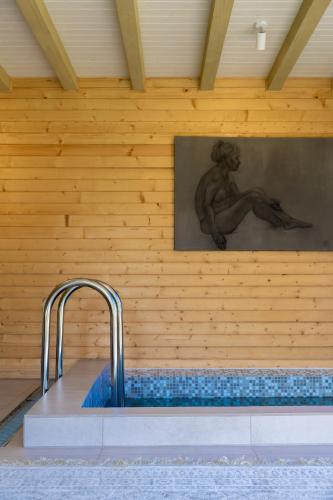 Piscina, Kalna Smīžu pirtiņa (Kalna Smizu pirtina) in Melturi