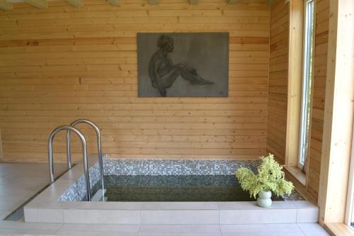 Piscina, Kalna Smīžu pirtiņa (Kalna Smizu pirtina) in Melturi