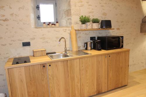 ห้องครัว, Châteauneuf Suites (Chateauneuf Suites) in ปูยี-ออง-โอซัว