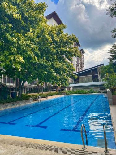 Swimming pool, ADI HIDEAWAY STAYCATION AT MATINA ENCLAVES 2BR near Mila Eatery