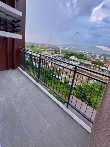 Balcony/terrace, ADI HIDEAWAY STAYCATION AT MATINA ENCLAVES 2BR near Mila Eatery