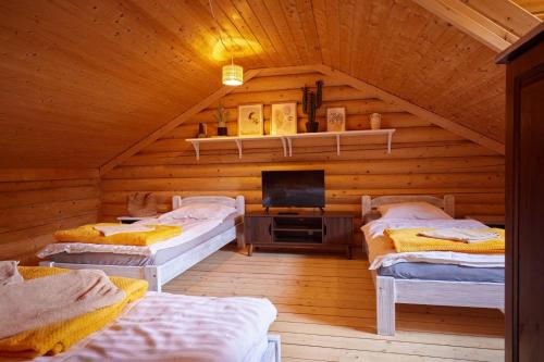 Domy z Bala przy plaży- Domki klimatyzowane - JACUZZI, SAUNA, lody, popcorn, ryba wedzona i ognisko gratis-od maja! – Dziwnowek, KY