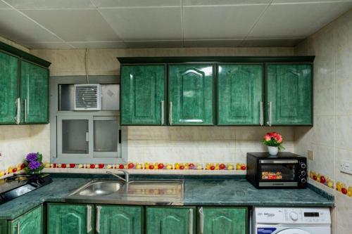 Kitchen, Private Family Rooms - Baith Al Jannah abudhabi  near Universal Speciality Medical Center