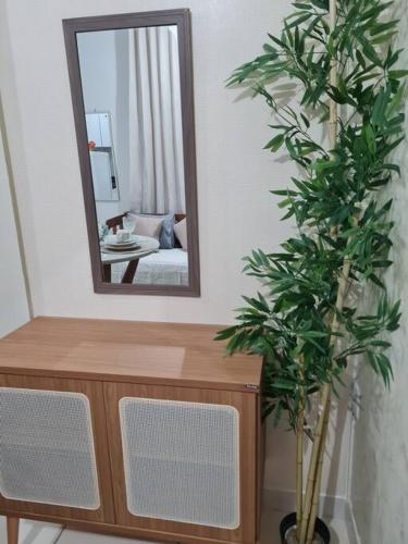 Kitnet 105 central com lavadora tv smart e ar condicionado