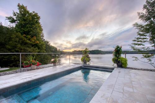 Side by Side Serenity Lakefront Homes with Infinity Pool 1833 in Kingsley, USA