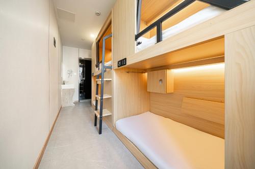 Bed in 4-Bed Male Dormitory Room -  Shared Bathroom  image 1