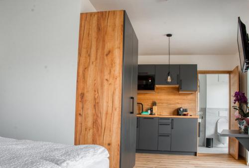 myQuartier City Chalets digital self check in Room Type - Studio M