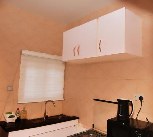 Kitchen, Haven Heights Apartments in Alimosho