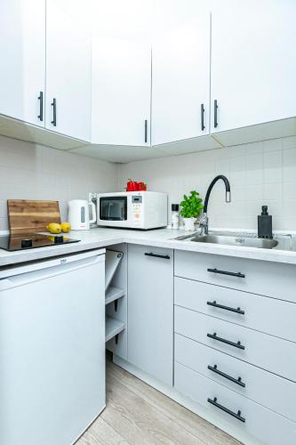 Bagno 7 grey - Stacja metra 300m - underground station 300m Better Rental, Varsovia (foto 11)