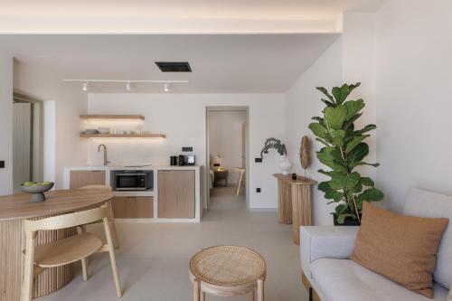 Morfes Luxury Suites by Caldera Houses - Tap to explore photos