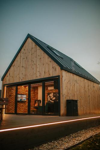 Exterior view of Nowoczesny drewniany domek CHILL HOUSE