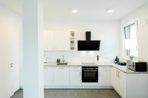 Konyha, koCASA-Apartments 02, Design, City-Center Böblingen, Stellplatz, Balkon (koCASA-Apartments 02, Design, City-Center Boblingen, Stellplatz, Balkon) in Boblingen Városközpont