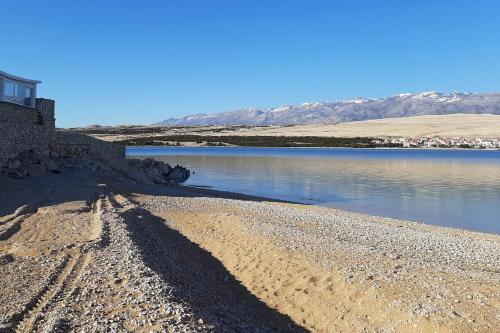 pludmale, Secluded fisherman's cottage Cove Prnjica, Pag - 23456 in Kolan