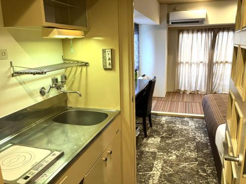 Double Room with Small Double Bed and Tatami Area - Smoking image 3