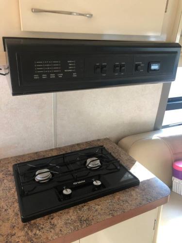 Private and cozy RV with full hookups in a convenient area with direct bus to NYC Manhattan only 2 blocks away