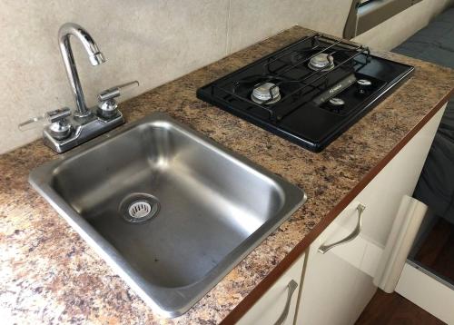 Private and cozy RV with full hookups in a convenient area with direct bus to NYC Manhattan only 2 blocks away