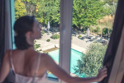 Kilátás, Logis Hotel Restaurant Le Plantevin in Propiac