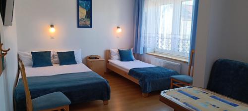 Pokoje i Apartamenty Ara Karwia