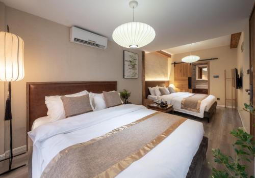 Beijing Le Zai Nan Luo Gu Xiang Wang Fu Jing Forbidden City Courtyard Hotel&Free laundry service&Free coffee &Paid Dumpling experience service