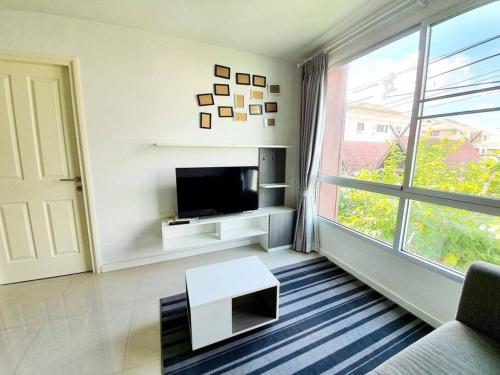 Cozy 1-Bedroom in D'vieng Condo - Tap to explore photos