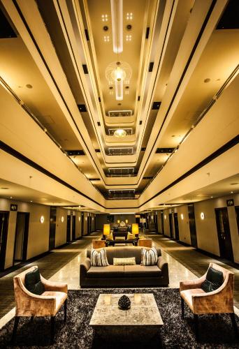 Shared lounge/TV area, Coastlands Umhlanga Hotel and Convention Centre in Durban