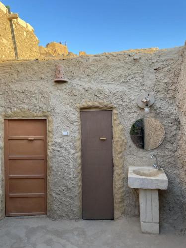 bain en source thermale , Lotus House in Siwa