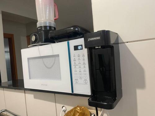 Apt inteiro frente ao aeroporto 2 quartos