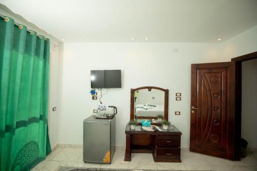 ElSharq ElAwsat Pyramids Inn - image 6