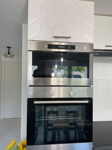 Logement cosy à 15 mn de la gare saint Lazare et 30 mn de l'aéroport Charles de Gaulles (Logement cosy a 15 mn de la gare saint Lazare et 30 mn de l'aeroport Charles de Gaulles) in Cormeilles-en-Parisis