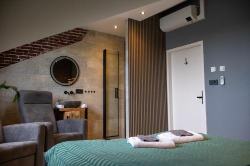 Zeeschelp - Comfortabele kamer bij B&B Gezond aan Zee - Toegang Wellnesstuin meerprijs, Ouddorp
