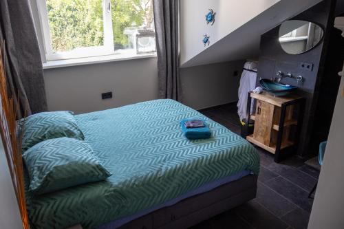 Koraal - Comfortabele kamer bij B&B Gezond aan Zee - Exclusief Wellnesstuin, Ouddorp (fotografie 10)