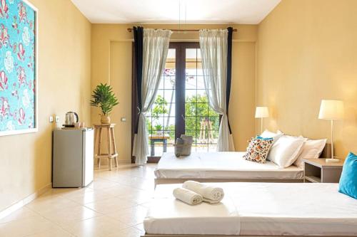 Quadruple Room with Garden View room in Color Villa - South Paradise 5