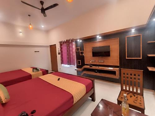 Koplietošanas atpūtas telpa ar TV, KANNA GARDEN BY BODHI BUNGALOWS in Ariyurnadu