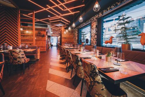 Restaurant, 24 by Avenida Hotel & Residences Kaprun by Alpin Rentals in Kaprun