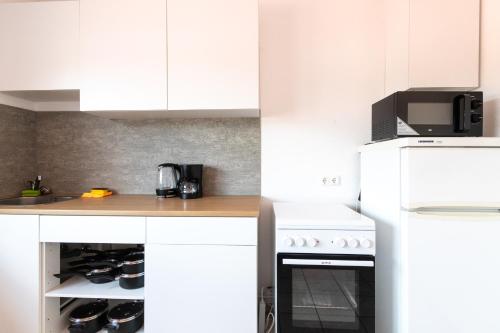 Monteurapartment I 8 Betten I Kuche I Waschmaschine I Balkon in Munster Bei Dieburg
