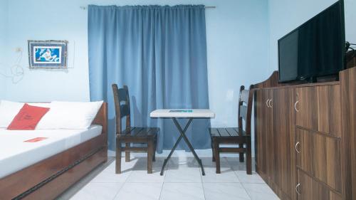 RedDoorz @ Raj Inn Guimaras in Guimaras sala