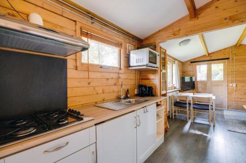 Chalet 'De Taxus' in de Veluwe in เอพ