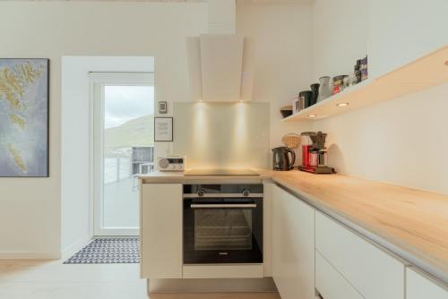 Attrezzature e servizi, A pearl in a forgotten fjord - Luxury Boathouse in Gjogv