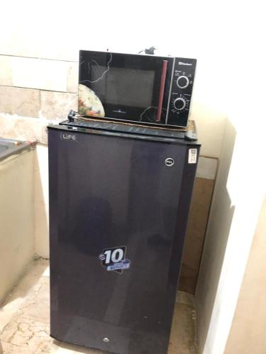 F-10 two bed Posh Apartment lounge kitchen AC WiFi smart Tv - main image