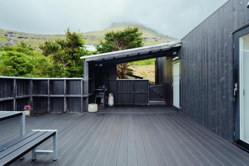 Terrazzo/balcone, A pearl in a forgotten fjord - Luxury Boathouse in Gjogv