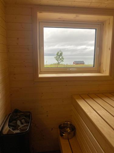 Sauna, Unique and charming holiday home with fantastic sea views in Straumsbukta