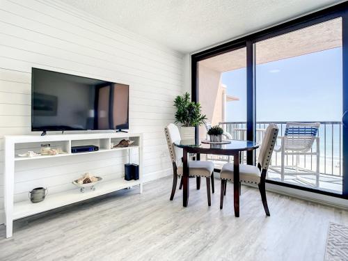Oceanfront Sunrise Overlooking Pool Walk to shopping dining Sunrise 805 in Edgewater, USA