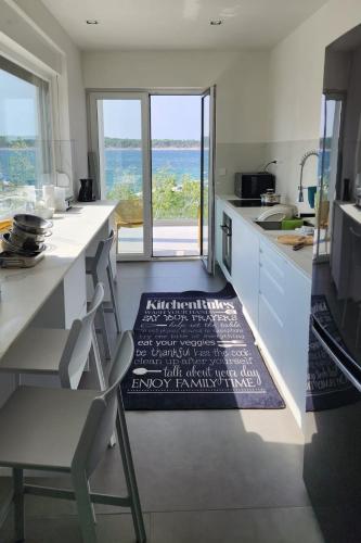 bucătărie, Apartments by the sea Banjol, Rab - 19752 in Rab