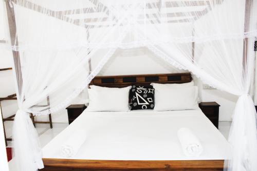 Standard Triple Room room in Sunrise Cottage