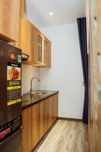 Küche, Apartment (175 m²), 1 Schlafzimmer und 1 eigene Badezimmer in Kien An District (Gala Hotel & Apartment) in Andere
