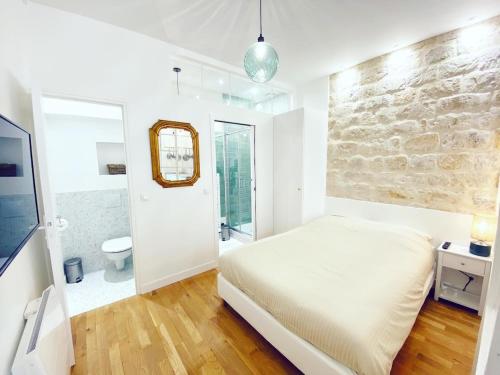 Tres bel appartement au coeur de Paris - FLAT-GUEST, Париж