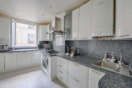 Le Petit Hôtel - Appt 6p 127 m² à Paris - image 11
