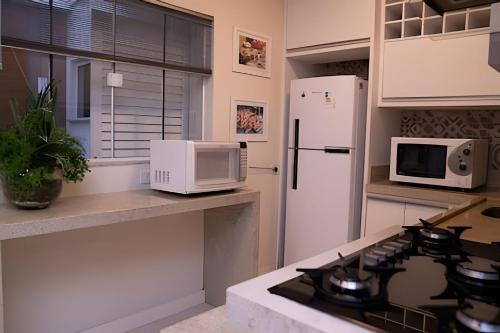 Sobrado com 1 suite 2 quarto ar 1km Shopping JL