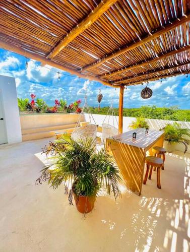 Lush Tulum Jungle Penthouse with Ensuite Rooftop Pool & HighSpeed Wifi in Balcheil, Mexico
