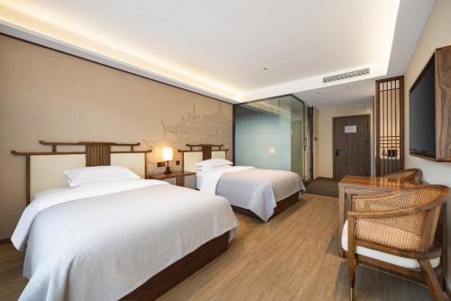 鸿胪花园酒店 入住赠送百威啤酒2瓶 鸿胪花园酒店 入住赠送百威啤酒2瓶